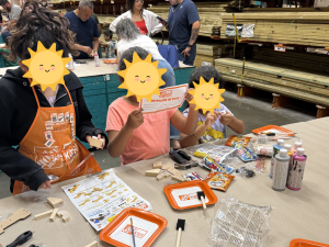 Children from Sunny Glen Children's Home, a children's charity near Harlingen TX, take part in a Home Depot Kids Workshop arts and crafts session, working with wood craft kits and paint supplies at the store.