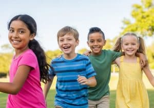 Smiling kids playing at a children’s home near me, showing joy and healing in a safe, caring environment.