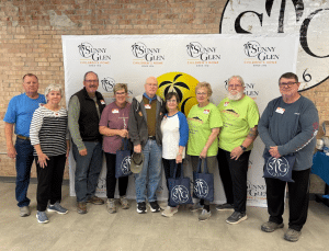 The Sojourners, a Church of Christ volunteer group, standing together at Sunny Glen Children’s Home, reflecting faith, shared work, and a commitment to serving children through hands-on ministry and fellowship