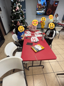 Children at Sunny Glen enjoying game day with volunteers who are donating their time, a meaningful way to donate without money and build connection through play.