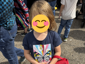 Child at a Sunny Glen outing reflecting positive behaviors through supportive community activities and consistent care.