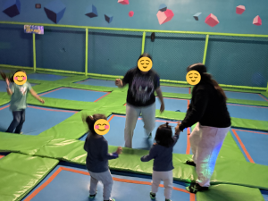Children jumping and playing together at a trampoline park, highlighting the importance of child abuse prevention month in ensuring safe, joyful experiences for vulnerable kids.