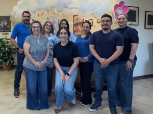Sunny Glen Children's Home staff wear blue in support of National Child Abuse Prevention Month, representing the importance of learning to help a child in crisis