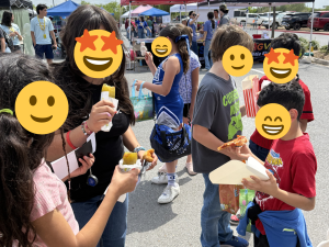 Children from Sunny Glen Children’s Home joyfully celebrating at a Spring Festival, embodying the hope and bright futures made possible through estate planning for charitable giving.