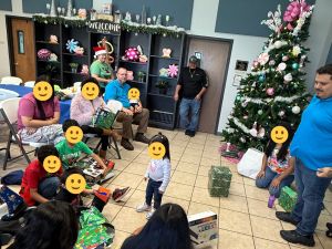 Children enjoy a Christmas party hosted by North Mission Church of Christ at Sunny Glen Children’s Home, showing how churches can help foster children through joyful community support.